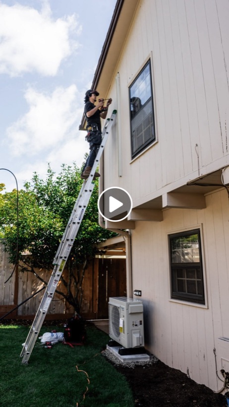 Technician installing a new system